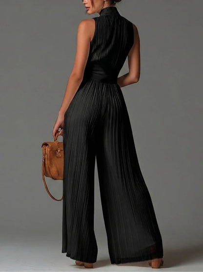 Mono Negro sin Mangas de Chiffon con Escote en V, Pliegues, Cremallera y Pernera Ancha